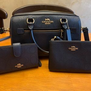 Coach handbag, wallet and wristlet.